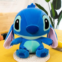 Stitch plush toy sitting upright, 28 cm tall