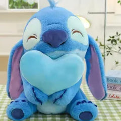 35cm Heart Stitch soft toy holding a heart, made of plush fabric, ideal for cuddles and gifting