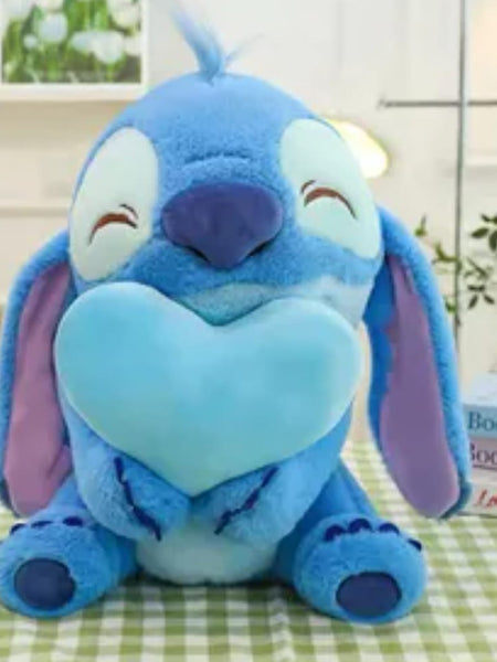 35cm Heart Stitch soft toy holding a heart, made of plush fabric, ideal for cuddles and gifting