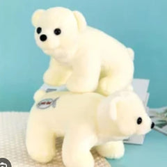 Two white plush polar bears on a light blue background