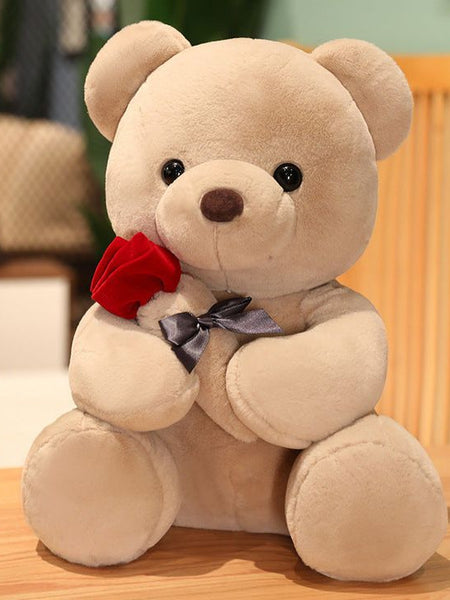 “38 cm beige teddy bear holding a red rose with bow tie”