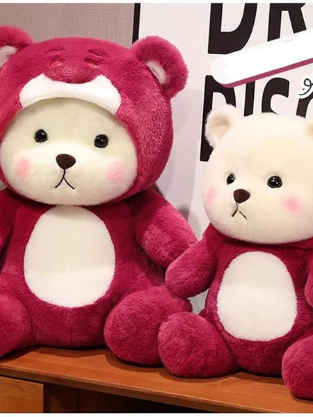 “Cute plush teddy in red hoodie sitting upright”