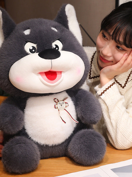 Cute plush puppy with round cheeks and badge