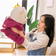 “Cute plush teddy in red hoodie sitting upright”