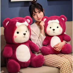 “Cute plush teddy in red hoodie sitting upright”