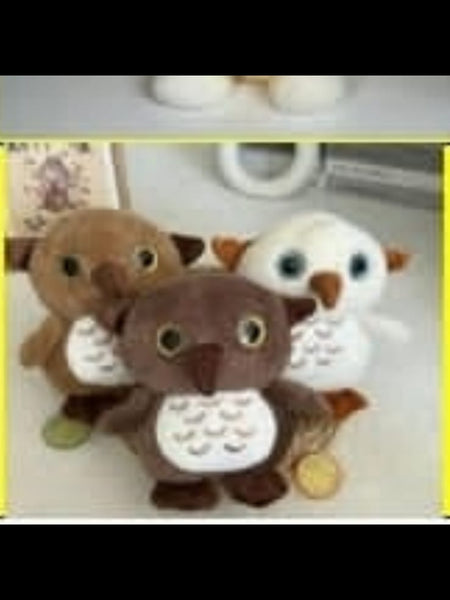 “28 cm owl soft toy with fluffy feathers and big eyes”