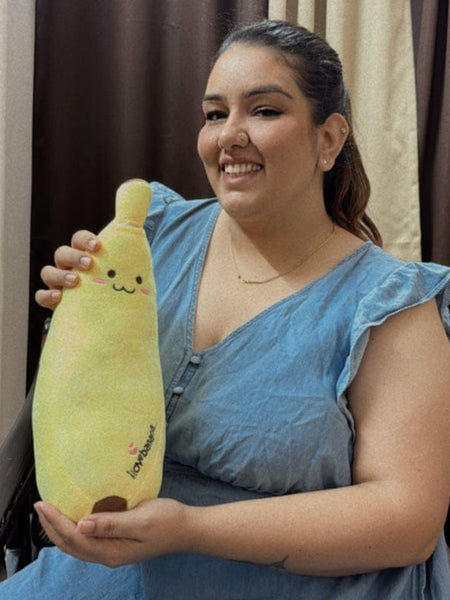 “28 cm banana plush toy with cute smiling face”
