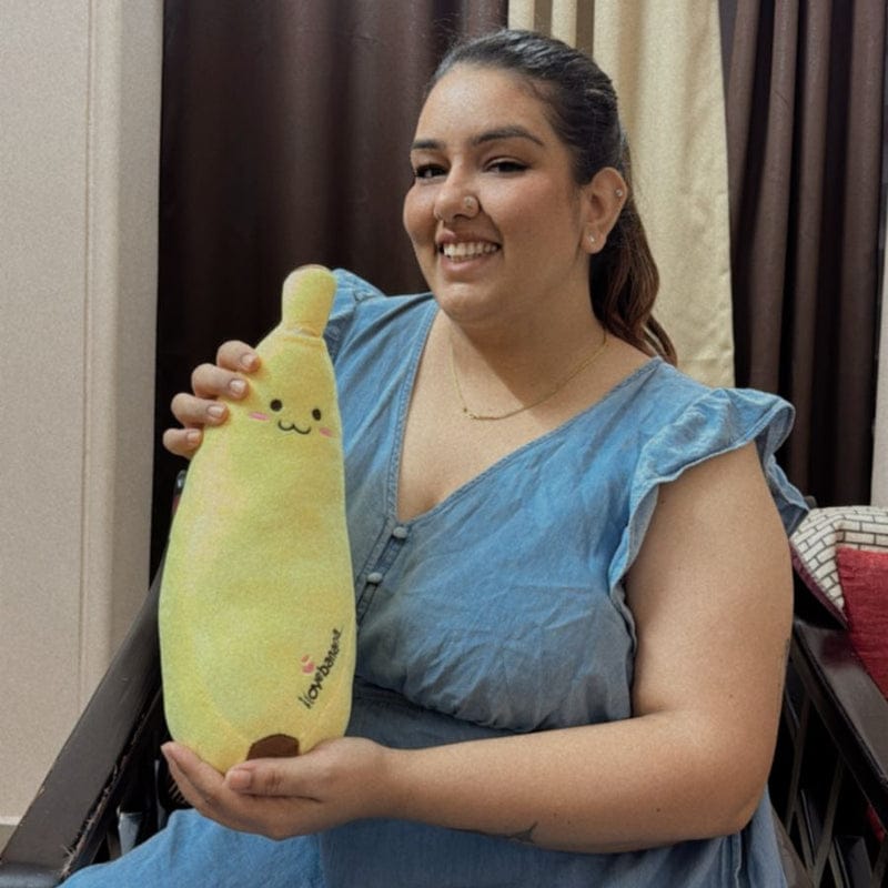 “28 cm banana plush toy with cute smiling face”