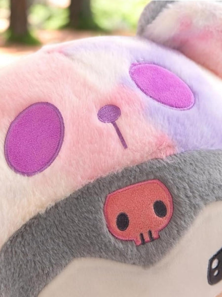 “Cute character plush doll sitting upright in multicolor design”